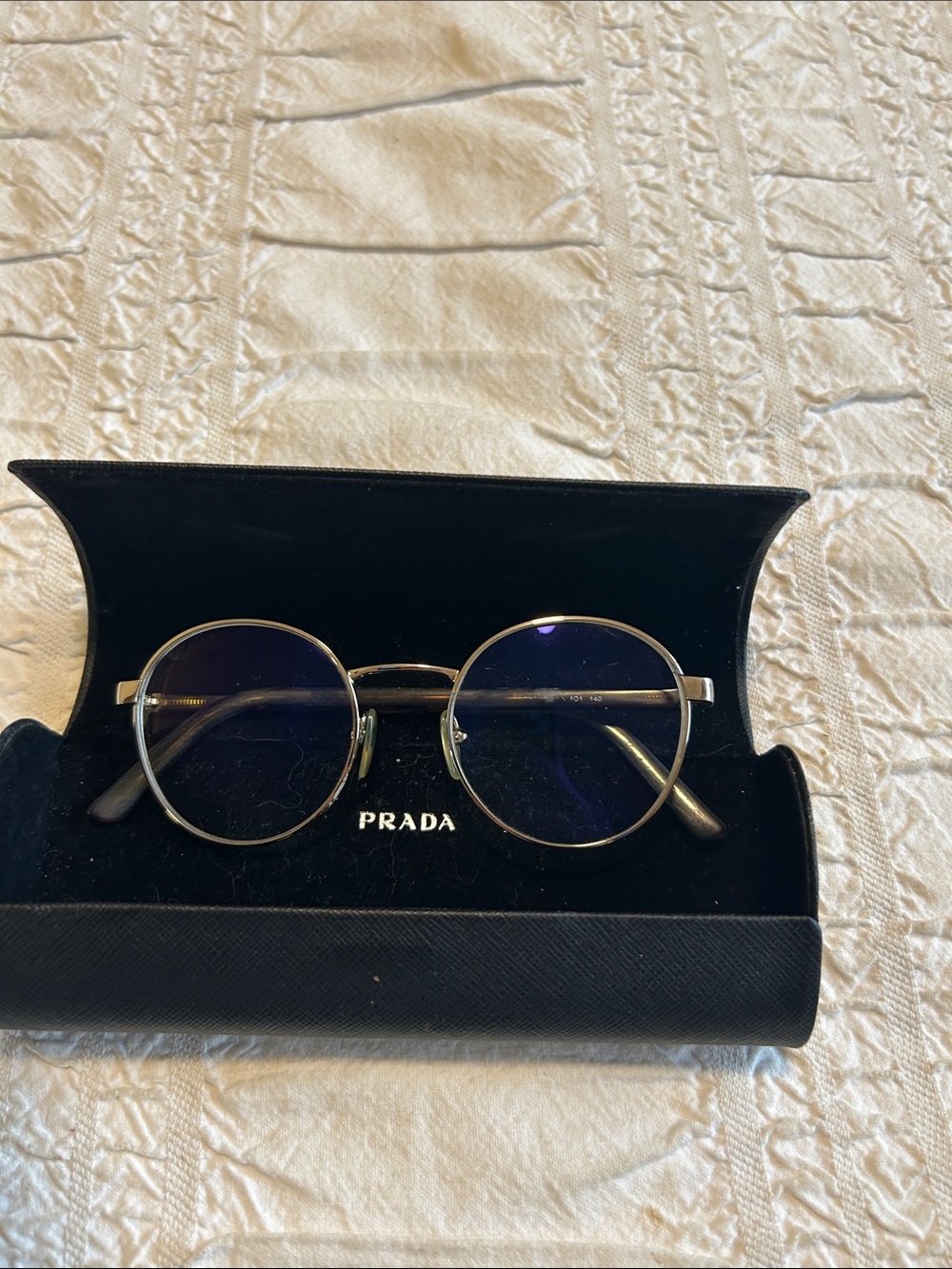 Prada Round Metal Frame Glasses with Black Temples and Silver Frame